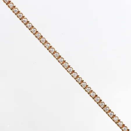 Armband, rivière, med 51s briljantslipade diamanter totalt 1,71ctv enligt kvittokopia ifrån kaplans, kvalitet ca TW/VS, längd 16cm, bredd: 3,1mm, etui, 18K Vikt: 11,8 g