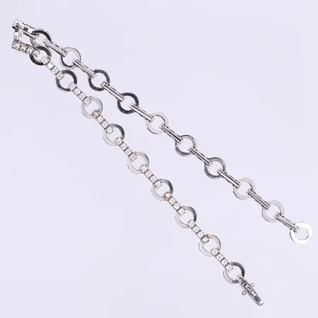 Armband med vita stenar 19,5cm bredd 6mm vitguld 14K Bruttovikt: 7,9g Vikt: 7,9 g