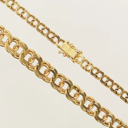 Collier Bismarck doserad längd 44,5mm bredd 5,4-9,8mm 18K Vikt: 35,9 g