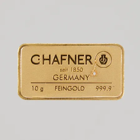 Guldtacka Chafner Germany, serienr 234798, mått ca 33,1x17,6mm, Fein gold, borrhål, bruten plombering, 999,9/1000 24K, Vikt: 10 g