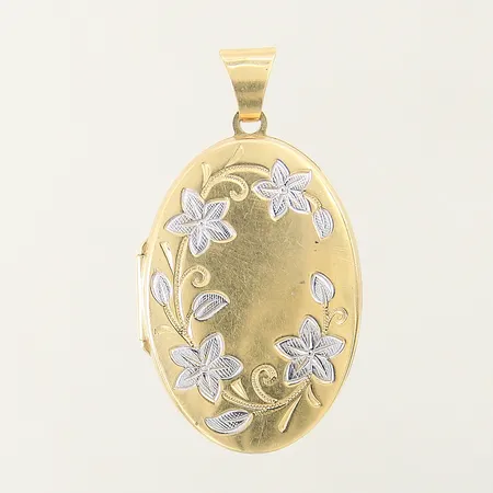 Medaljong/fotogömma med blomdekor 40x22mm GHA vitguldsdetaljer, gravyr 18K Vikt: 6,5 g
