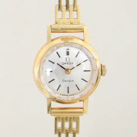 Damur Omega Genéve 18K mnauell Ø20mm, korridorlänk 18K, safirglas, total längd 18cm, gravyr 18K bruttovikt: 24,9