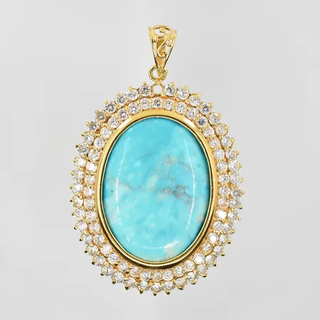Hänge med troligen larimar och vita stenar stl:35x52 mm, 1 sten saknas, 21K. Vikt: 17,4 g