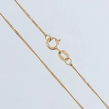 Kedja pansar längd 42cm bredd 0,8mm ojämn 18K.  Vikt: 1,3 g