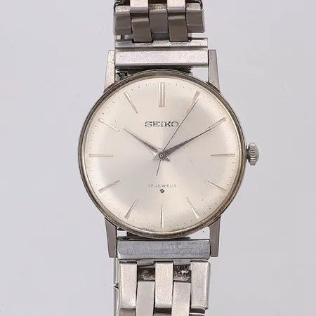 Herrur Seiko stål manuell Ø32mm nr 66-9990 182057, slitet flexarmband