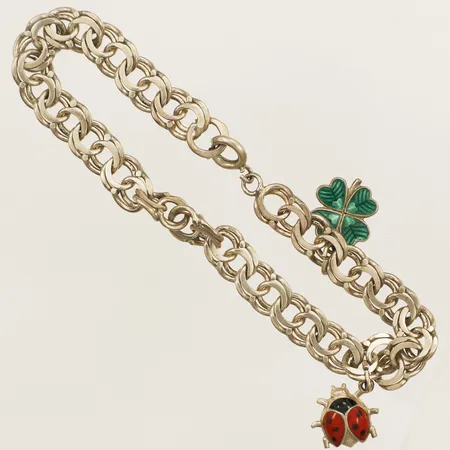 Armband Bismarck med två berlocker med emaljdetaljer längd 19,5cm bredd 7,1mm silver Vikt: 11,9 g