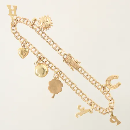 Armband Bismarck med 8st berlocker längd 17,5cm bredd 3,9-8,8mm 18K Vikt: 8,8 g