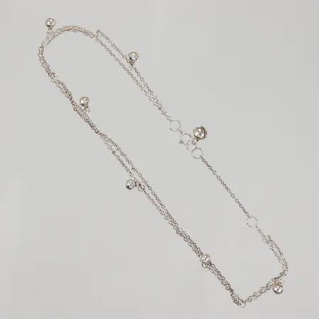 Vristlänk med 7 berlocker 27cm bredd 1,5mm, smärre ojämnheter, en berlock bjällrar, 925/1000 silver, Vikt: 3,7 g