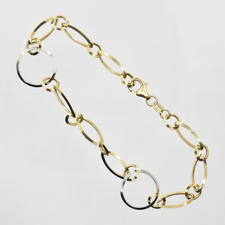 Armband med ringar längd 21 cm, bredd 7-15 mm, gulguld/vitguld, 14K. Vikt: 2,7 g
