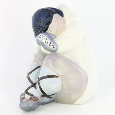 Figurin Lladro vilande Inuit, numererad 24, höjd 25cm, sprickor i ena foten Skickas med paket.