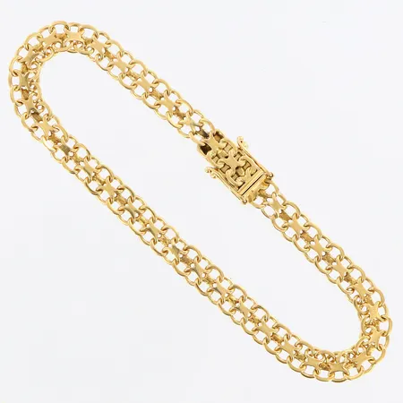 Armband X-länk längd 19cm, bredd 6mm, 18K Vikt: 9,1 g