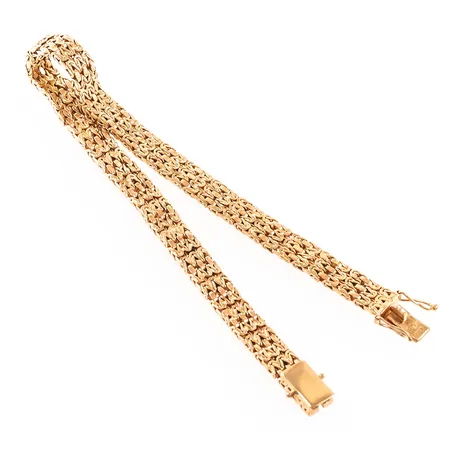 Armband längd 19cm bredd 5,5mm, defekta länkar, 18K 18,7g.