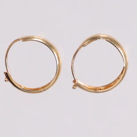 Ett par örhängen Creoler Ø13½ något ojämn 18K Vikt: 0,6 g