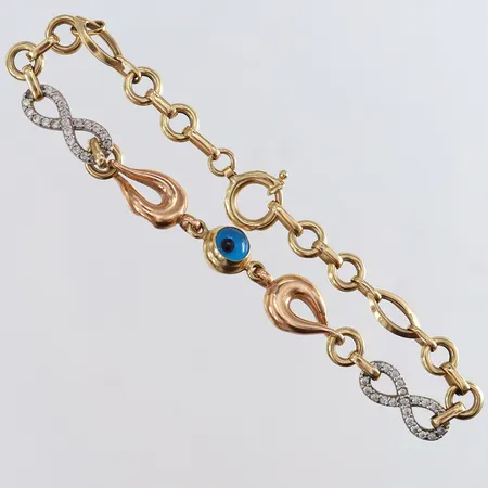 Armband med stenar längd 19cm bredd 6-8,5mm buckligt lås 14K.  Vikt: 6,2 g