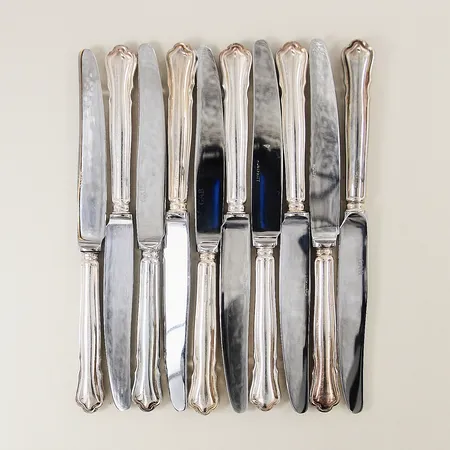 10 förrättsknivar GAB modell Chippendale längd 17,5cm blad i rostfritt stål silver 830/1000 bruttovikt: 429,5g Vikt: 0 g