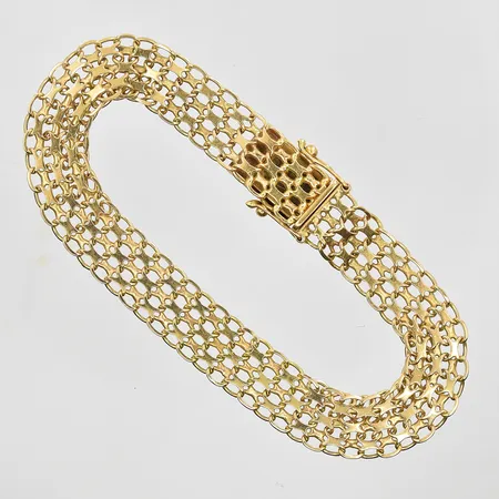Armband X-länk längd 18 cm bredd 10 mm, 18K. Vikt: 11,3 g