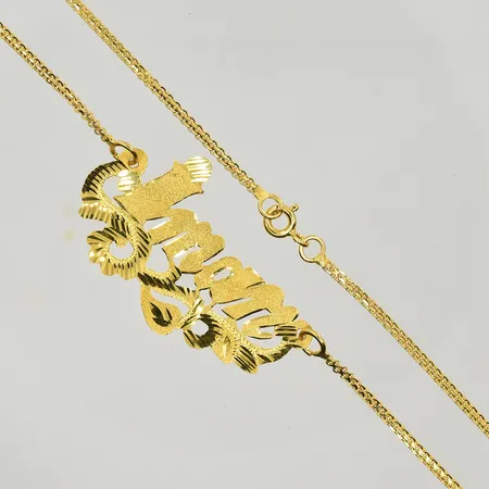 Collier med namn Iman, längd 39½ cm, länkens bredd 2 mm, 21K. Vikt: 6 g