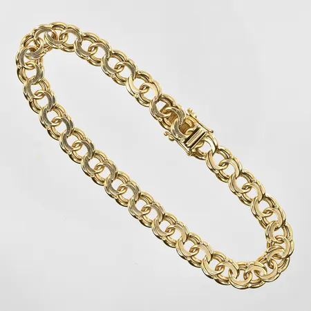 Armband Bismarck längd 22 cm bredd 8 mm, 18K. Vikt: 28,3 g