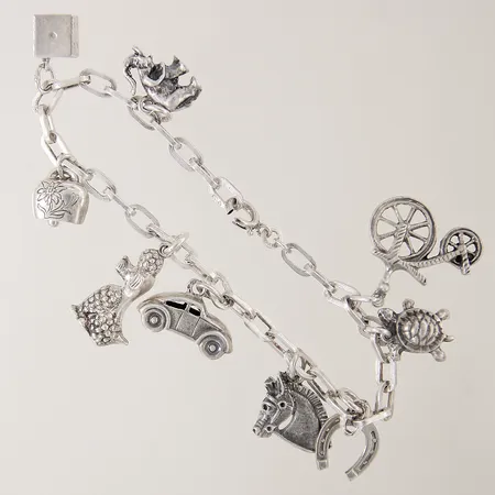 Armband med 10st berlocker längd 18cm bredd 4-20mm silver 830/100 Vikt: 22,3 g