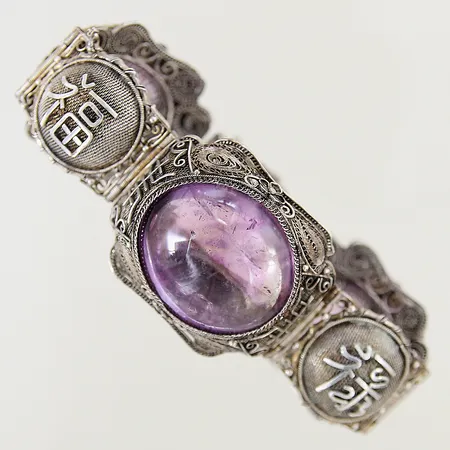 Armband med ametister samt filigranarbete längd 18cm bredd 20-29mm säkerhetskedja defekt svensk importstämpel silver 830/1000 Vikt: 56,7 g