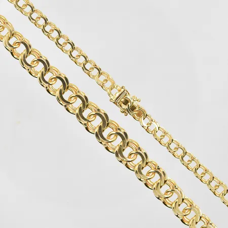 Collier Bismarck doserad längd 46½, bredd 6-10 mm, 18K. Vikt: 45,1 g