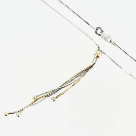 Collier längd 46cm vitguld/gulguld, ögla vid lås i metall, skevheter på länk, 14K Vikt: 5,5 g