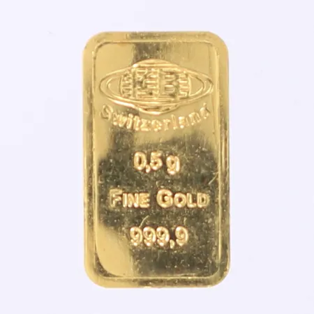1 Guldtacka KB Schweiz enligt certfikat 15x9mm 24K Vikt: 0,5 g