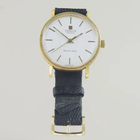 Herrur Tissot Seastar Seven diam 33 mm, 18K, defekt armband, fungerar vid enklare test, vi lämnar ingen funktions garanti. 