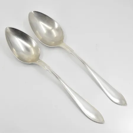 2 skedar modell Svensk spetsig M B Stehn L7/1913 och CGH V7/1923 längd 19½ cm, gravyr baksida skaft, silver 830/1000. Vikt: 77,4 g