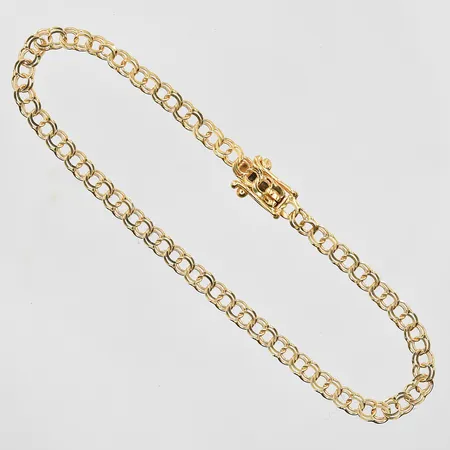Armband Bismarck längd 18½ cm, bredd 4 mm, 18K. Vikt: 3,9 g