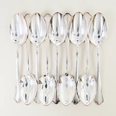 9 förättsskedar GAB modell Chippendale längd 18cm silver 830/1000 Vikt: 303,2 g