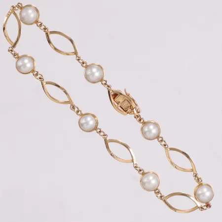 Armband med pärlor längd 20cm kistlås 18K Vikt: 5,3 g