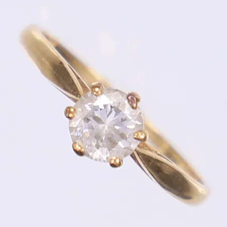 Ring med vit sten stl:16¾ bredd 1-6mm 18K Vikt: 1,8 g