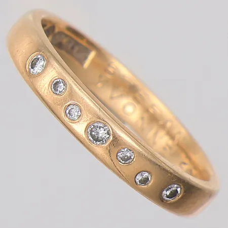 Ring diamanter ca 0,11ctv enligt gravyr stl:17¼, gravyr, 18K Vikt: 3,7 g