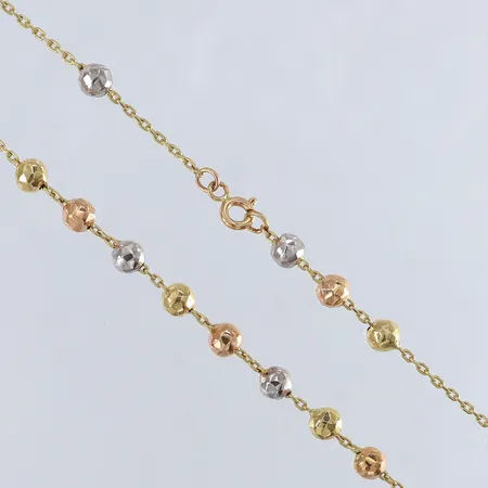 Collier med kulor längd 46,5cm bredd 5mm trefärgat 18K. Vikt: 7,4 g