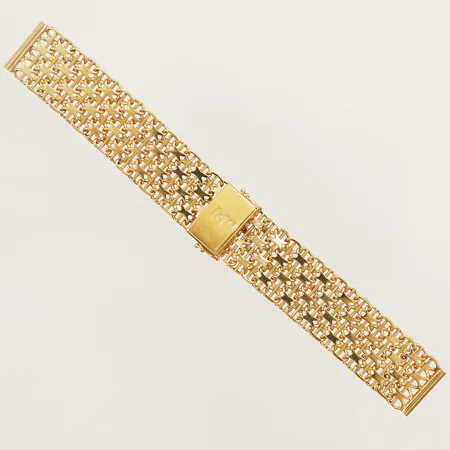 Klockarmband X-länk längd ca 16cm bredd 19,4mm Styletta Guldvaruaktiebolaget år 1970 Stockholm 18K Vikt: 39,9 g
