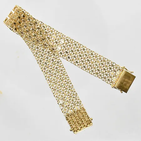 Armband X-länk med stav längd 21½ cm, bredd 17 cm, mindre klämskada på länk, 18K. Vikt: 25,2 g