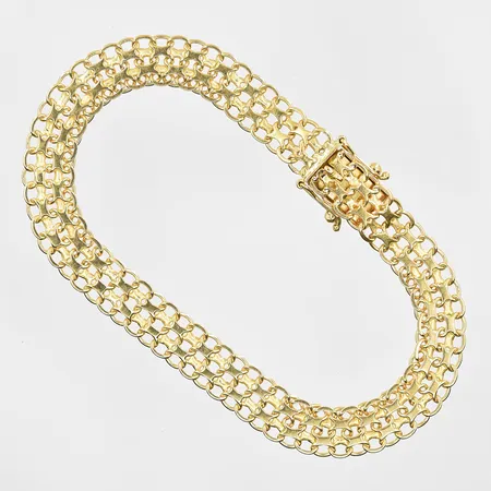 Armband X-länk längd 18½ cm bredd 8 mm, 18K. Vikt: 11 g