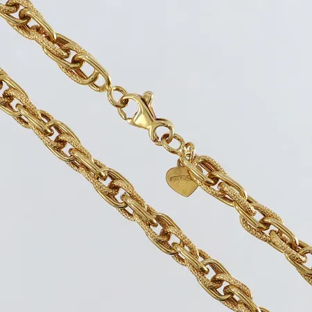 Collier med dekor längd 45cm bredd 5,5mm ihålig 18K.  Vikt: 19 g