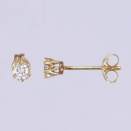 Ett par örhängen med diamanter 2x ca 0,10ct Ø3mm, omaka snurrebussar, 18K Vikt: 0,9 g