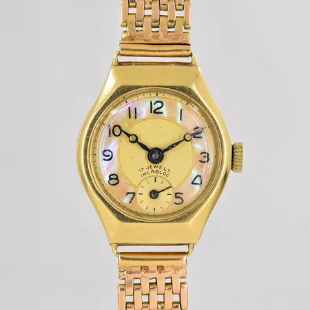 Damur 24x21mm 14K manuell defekt, går ej, band 14K bruttovikt:22,4g