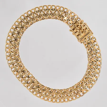 Armband X-länk längd 19,5cm bredd 9,5mm 18K Vikt: 19 g