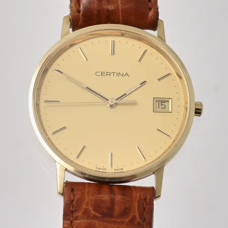 Herrur Certina i 14K guld, quartz, Ø33,5mm, datum, läderband, 19,7cm inklusive ur, personlig gravyr på bakboett, i behov av batteribyte.