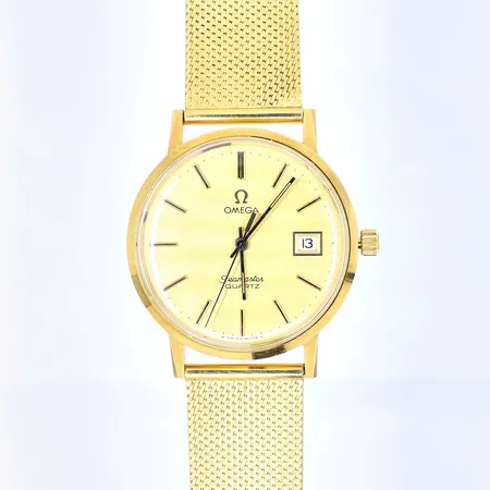 Herrur Omega Seamster quartz 18K, datum, Ø34,5mm, länk i 18K,längd ca 19-20cm, behov av batteribyte, original ask, Bruttovikt: 74,3g