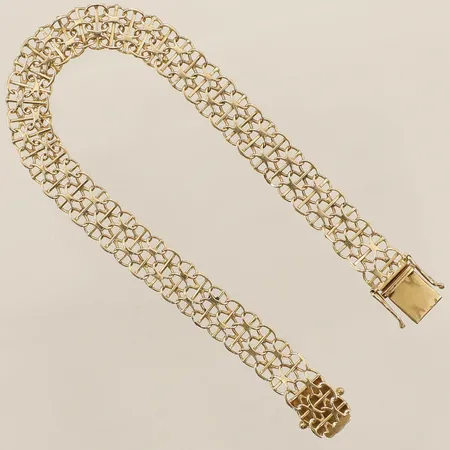 Armband X-länk med stav längd 20cm bredd 8,7mm buckliga länkar 18K Vikt: 9,9 g