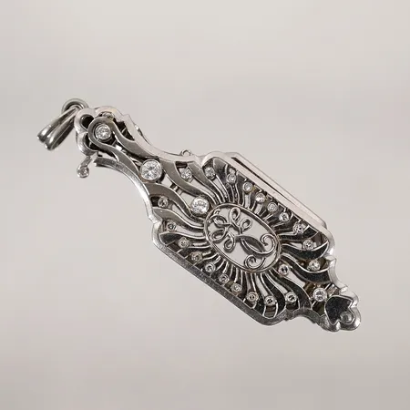 Lornjett/vikbara glasögon med diamanter längd: 6.5cm bredd: 2cm 18k bruttovikt med glaset  Vikt: 34,9 g