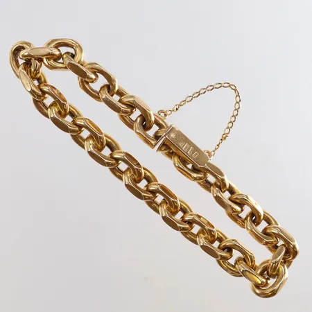 Armband ankar längd ca 20cm bredd 9,5mm säkerhetskedja ihålig 18K. Vikt: 38,3 g