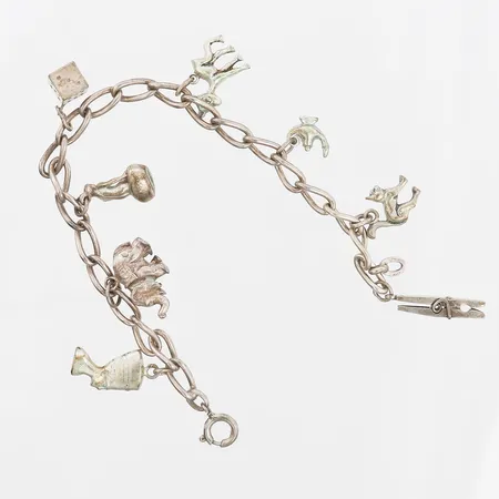 Berlockarmband med 8st berlocker, längd 20cm, silver 830/1000 Vikt: 27,8 g