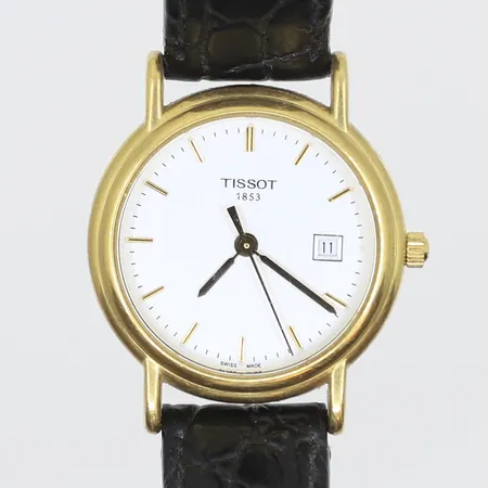 Damur Tissot Ø26mm, quartz, datum, boett i 18K, gravyr, slitet läderband, spänne i stål, fungerar ej