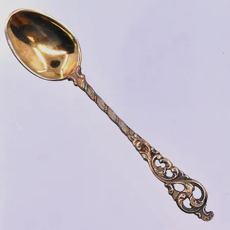 4 skedar längd 10 cm förgyllt silver 830/1000. Vikt: 32 g